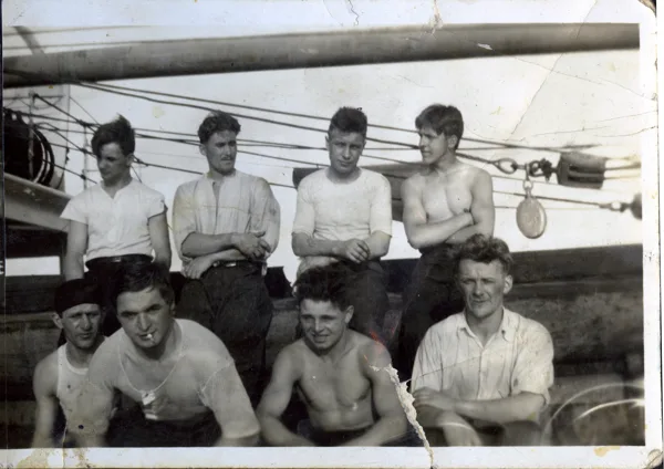 Eight sailors on ship. Hans is in the top row, second from the right. Identification supplied by the family. Vessel, location and date remain unconfirmed.